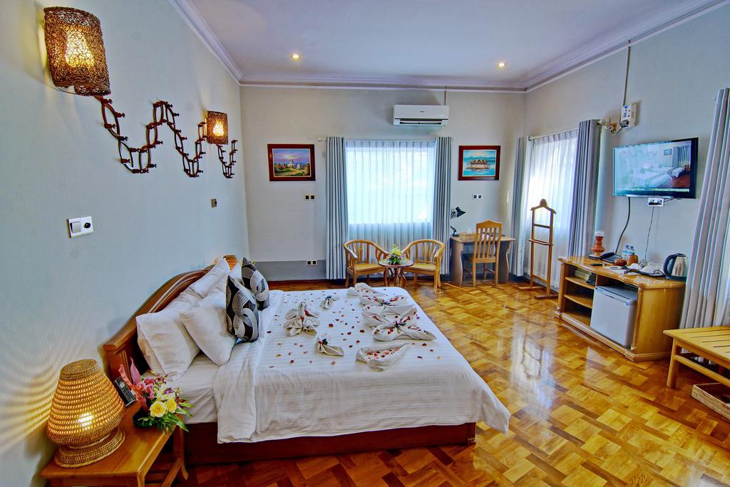 Triumph Hotel Mandalay Extérieur photo